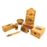 Mauchline ware - needle box, letter rack and boxes, decorated with transfers of Eastbourne (8)