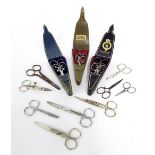 Two complete sets of cased scissors, another incomplete; together with nine further pairs of