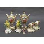 Pair of Capo di Monte twin-handled porcelain urns decorated in relief with a chariot scene with