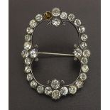 Antique clear paste silver set brooch, 52mm x 40mm (one stone missing)