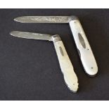 Two late Victorian silver and mother of pearl handled folding fruit knives, one by CWF, the other