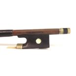 French nickel mounted violin bow by and stamped Gustave Villaume, the stick round, the ebony frog