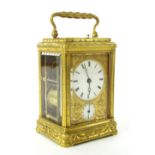 Fine repeater carriage clock striking on a bell, the back door with wind reveal lever, the 2"