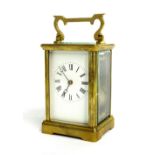 Carriage clock timepiece within a corniche brass case, 6" high