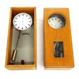 Two Favag electric master clocks for spares/repair, each in a light oak case, 27" high (2)