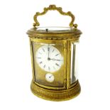 Fine French Drocourt grand sonnerie repeater oval carriage clock with alarm, the movement back plate