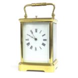 French repeater carriage clock striking on a gong, within a gilded brass case, 7.5" high