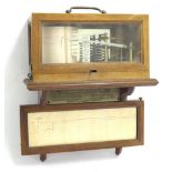 Unusual French wall barograph, within a light wooden bevelled glazed case with mirrored back and