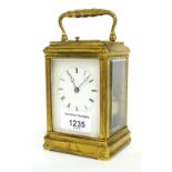 Repeater carriage clock striking on a bell, within a gilt gorge case, 6" high; with Morocco