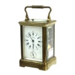 French repeater carriage clock with alarm and striking on a gong, the dial signed Examined by