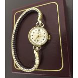 Tudor 9ct lady's wristwatch, case ref. 17C979, hallmarked Chester 1958, small circular silvered dial