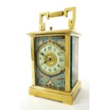 French repeater carriage clock striking on a gong, the movement back plate bearing the logo for