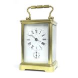 Good carriage clock with alarm and striking on a gong, within a corniche brass case, 6.5" high