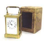 Good French repeater carriage clock striking on a gong, within a corniche gilded brass case, 6.25"