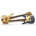 Two AXL bass guitars with distressed crackle finishes, one in blue, one in beige, both in working