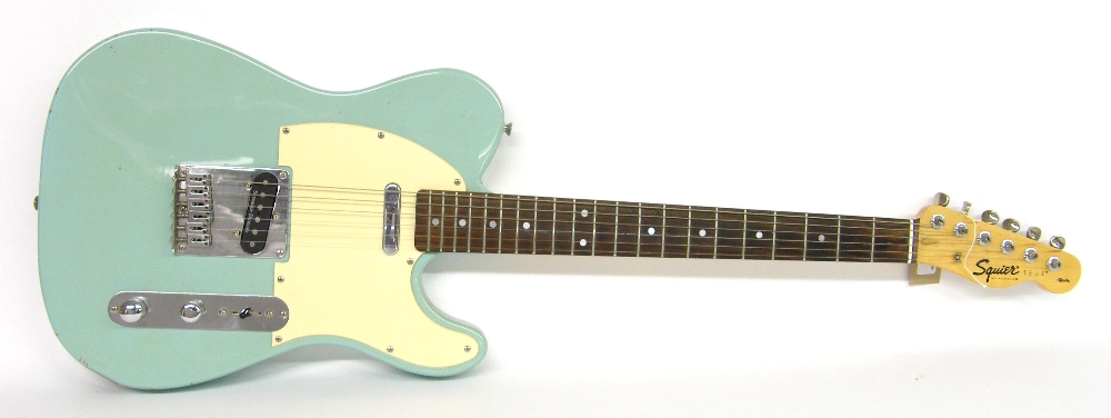 Squier by Fender Affinity series Telecaster electric guitar, pale blue finish with various