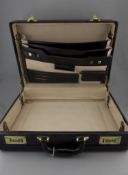 A Modern Black Leather Attache Case with