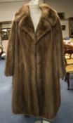 Ladies Full Length Blond Mink Coat fully lined with hook and eye fastening and slit pockets.