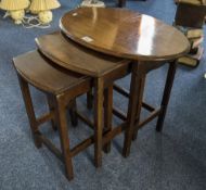 A Nest of Three Oval Tables, square legs.