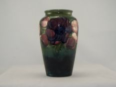 W. Moorcroft Tubelined Signed Vase ' Anemone ' Pattern on Green / Blue Ground.