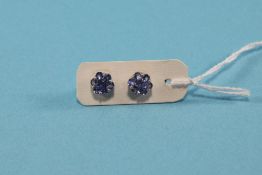 Pair of Tanzanite Stud Earrings, each comprising a cluster of seven round cut tanzanites,