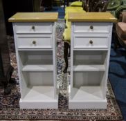 A Pair of Bedside Cabinets painted white 32 inches high, 14 by 11  inches square.