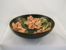 W. Moorcroft Large Footed Bowl ' Coral Hibiscus ' Pattern on Green Ground. c.1970's/1980's. 3.