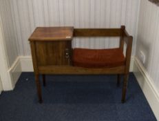 Telephone Hall Chair padded seat with single cupboard 28 inches high, 35 by 14 inches deep.