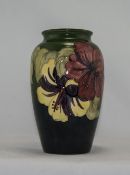 W. Moorcroft Signed Vase ' Hibiscus ' Design with Pink and Yellow Flowers on Green Ground.