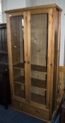 Tall Dark Pine Display Unit, Glazed Front With 2 Glass And 2 Pine Shelves Above Single Drawer To