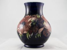 Moorcroft Signed Tubelined Bulbous Shaped Large Vase, In The ' Anemone ' Pattern on Blue Ground.