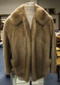 Ladies Short Blond Mink Jacket fully lined with hook and eye fastening and slit pockets.