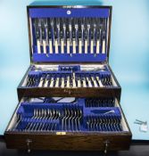 A Fine Quality Two Tier Oak Cased 90 Piece Canteen of Cutlery with key.