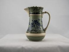 James Macintyre Gesso / Faience Pewter Lidded Jug. Marked M.