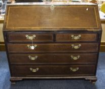 Georgian Mahogany Bureau Circa 1800 finely crossbanded to the flap and drawer fronts.