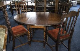 Early 20thC Oak Gate Leg Table with drop leaf sides and barley leg supports.