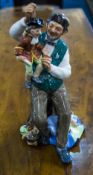 Royal Doulton Figure ' The Puppet Maker ' HN2253. Designer M. Nicoll. Issued 1962 - 1973.