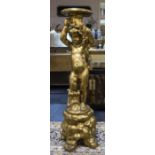 Italian Rococo Style Gilt Wood And Composite Figural Torchere/Jardiniere,