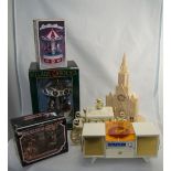 Collection of Six Musical Toys comprising Cathedral, Carriage, Musical Carousel Ornament,