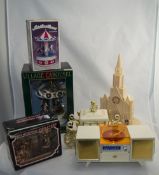 Collection of Six Musical Toys comprising Cathedral, Carriage, Musical Carousel Ornament,