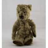 A 1920's / 1930's Mohair Teddy Bear, Straw Filled, Glass Eyes, Black Stitched Nose and Mouth.