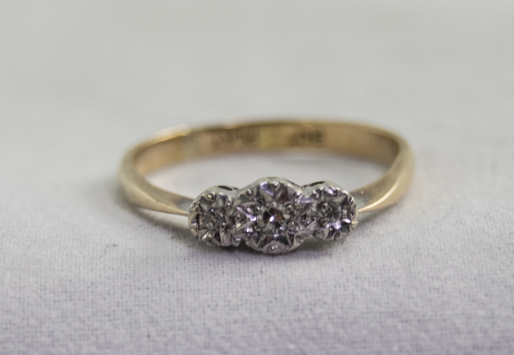 A 9ct Gold and Platinum Set 3 Stone Diamond Ring.