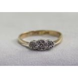 A 9ct Gold and Platinum Set 3 Stone Diamond Ring.