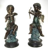 Pair of Bronze Putti With Bows and Arrows, each wearing drapes,