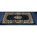 Woolen Rug, Black Ground With floral Pattern,