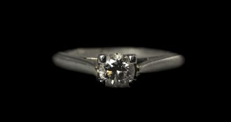 Platinum Single Stone Diamond Ring, Round Modern Brilliant Cut Diamond In A Four Claw Setting,