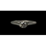 Platinum Single Stone Diamond Ring, Round Modern Brilliant Cut Diamond In A Four Claw Setting,