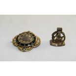 A 19th Century Gilt Metal and Enamel Mourning Brooch.