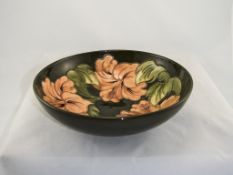 W. Moorcroft Large Footed Bowl ' Coral Hibiscus ' Pattern on Green Ground. c.1970's/1980's. 3.