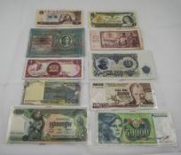 A Collection of Mid 20th Century World Bank Notes ( 11 ) In Total.